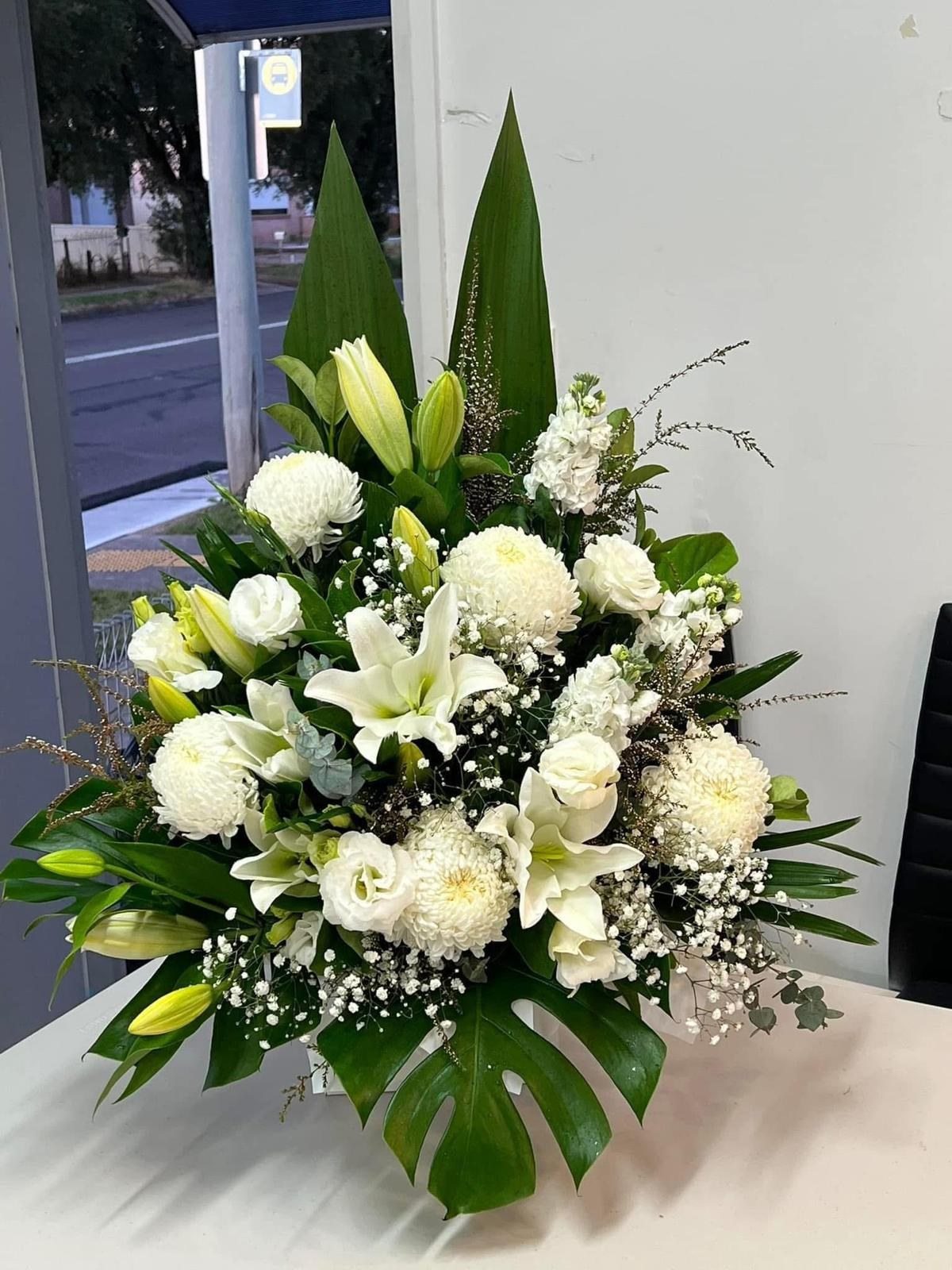 Sympathy flower arrangement by Everyday Flowers Sydney